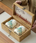 Vintage Airtight Ceramic Double Tea Canisters For Loose Leaf Coffee Beans And Spices inside a wooden box with decorative design.