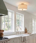 Newport 14 Inch Modern Two-Light Semi-Flush Mount Ceiling Light With Beige Linen Drum Shade And Oil-Rubbed Bronze Finish, Frosted Glass Diffuser Great For Kitchen Or Hallway Ambience installed in a bright kitchen
