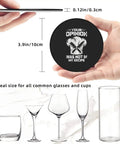 Person holding round leather coaster with skull graphic, part of Leather Coaster Set With Holder 6-Piece Absorbent PU Leather Drink Coasters.