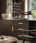 Five Pack Gold Cabinet Pulls With 3 Inch Hole Center Brushed Brass Finish on dark wood kitchen cabinets