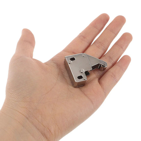 2 Pack Kitchen Cabinet Door Catch Latch, Stainless Steel Roller Lock held in hand showing size