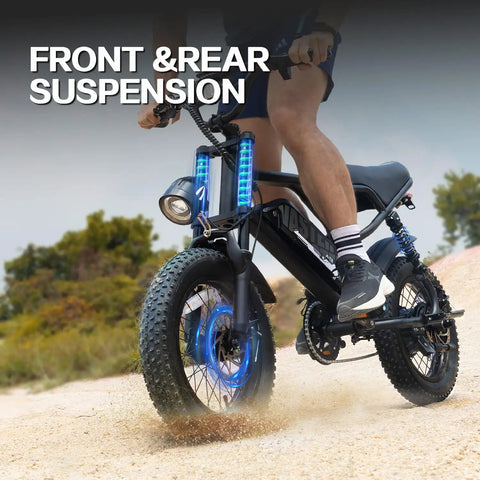 Rider on compact 16 inch fat tire electric bike for teens and adults with 500W motor, full suspension, dirt trail