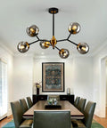 Six Light Glass Globe Chandelier With Adjustable Boom, Modern Semi Flush Mount Ceiling Light Fixture in dining room