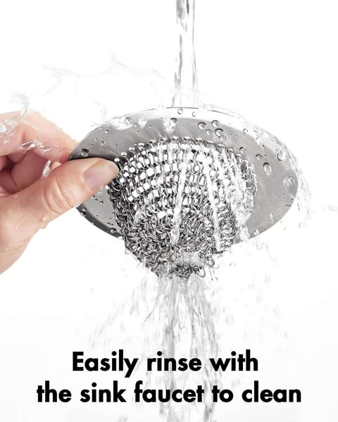 Reversible Chain Mesh Sink Strainer For Effortless Clean Up And Debris Catcher Large Capacity No Clog 304 Stainless Steel being rinsed