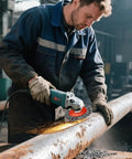 Worker using Five Pack 4 Inch Twist Knotted Wire Wheel Brush For Angle Grinder With 5/8-11 Arbor 0.02 Inch Carbon Steel Wire