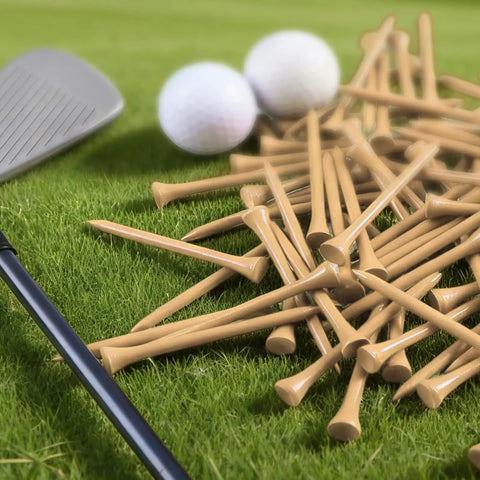 Natural Bamboo Golf Tees Wood Two And Three Quarters Inch And Three And One Quarter Inch Bulk Packs For All Day Practice Tough Tees For Men Women Kids 250 500 1000 2000 Count scattered on green grass beside golf club and balls