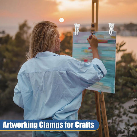 Artist painting outdoors at sunset with easel secured by 20 Pack Large Balloon Arch Clips 3.5 Inch Plastic Backdrop Spring Clamps