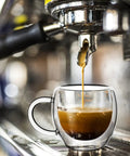 Double Wall Insulated Espresso Cups Set Of Two Borosilicate Glass Demitasse Mugs With Handle Heat Resistant Shot Glasses Straight Up Kitchen Essential Microwave Safe Daily Grind Must Have pouring espresso into a clear mug.