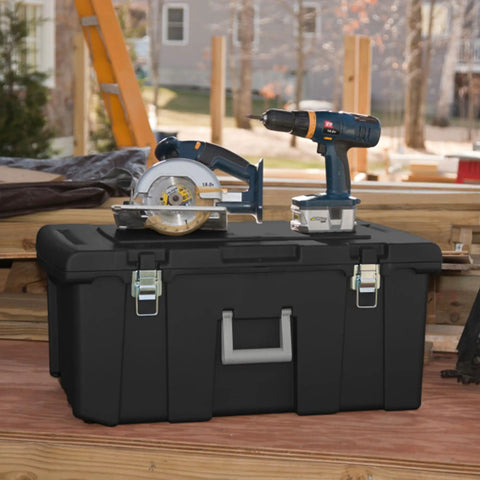 Flex Your Storage Game With Heavy Duty Plastic Footlocker Rolling Bin With Wheels And Handle, Stackable Tote Featuring Secure Latching Lid For Basements Dorms And Shared Spaces, Smooth Operator Hauler Chest In Black with power tools on top.