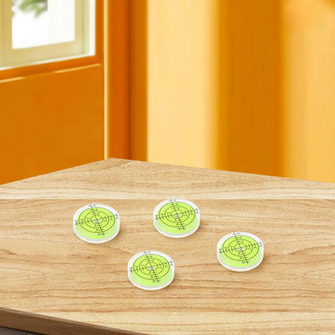 Four Pack Mini Bubble Level Ruler Set High Precision Compact Plastic Design For Accurate DIY Projects displayed on wooden surface
