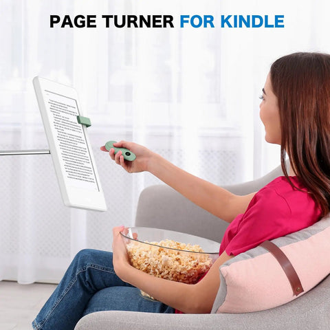 Person using RF Remote Page Turner Clicker For Kindle Paperwhite Scribe Oasis and tablets green hands free reading accessory
