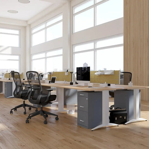 Office with desks, chairs, and a Three Drawer Vertical File Cabinet for Office Lockable and Mobile Holds Letter Size Documents Charcoal Steel Organizer 18.9 Inches Deep by 14.3 Inches Wide by 26.8 Inches High A Trusted Workhorse for Papers and Folders under the desk.
