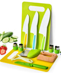 Montessori kids knife set, 13 pieces: plastic knives with colored grips, cutting boards, wooden toddler knife (front view).