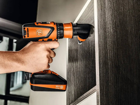 Battle Ready Heavy Duty Cordless Drill Driver Featuring Four Speed Rugged Metal Gearbox Brushless Motor Maximum Torque Output For Wood Metal Plastic Projects in use on panel.