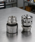 Heavy Duty 40 Micron NPT Hydraulic Tank Breather Cap 2 Pack. Aluminum alloy vent filter caps on metal work surface.