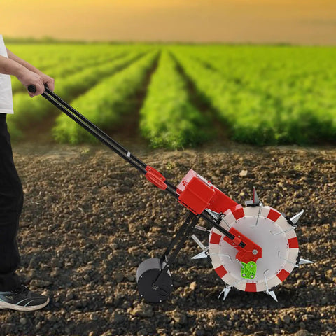 Hand Push Garden Seeder Roller Seeding Tool With 7 Nozzles in use on field, adjustable depth, walk behind for peanuts, corn, beans.