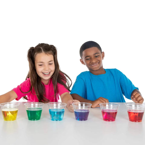 Kids enjoying True Color Fizzers Tub Tint Tablets Pack For Water Coloring One Tablet Colors Up To A Liter Includes Blue Red Yellow