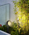 Low Voltage Landscape Spotlight Set 18W Outdoor Waterproof LED Path Lights illuminating garden with warm white glow