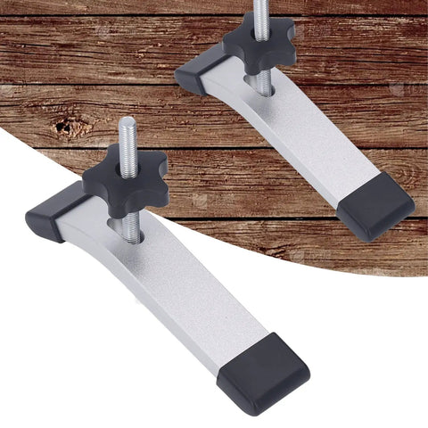Heavy Duty T Track Hold Down Clamps Made Of Aluminum For Woodworking Jigs To Secure Workpieces On CNC Router Table Saw And Drill Press With M8 Thread 6.3 Inch Long Grip For Pros shown in detail on wood surface.