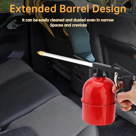 Rugged Pneumatic Cleaning Spray Gun With 6mm Nozzle And 750ml Aluminum Cup in hand, designed for cleaning car interiors.