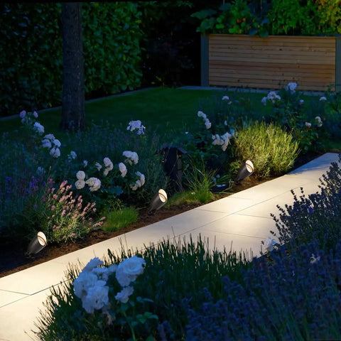 4 Pack 12V Low Voltage Landscape Lighting Kit, Die-Cast Aluminum Spotlight Path Lights illuminating garden path