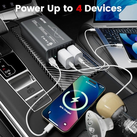 Beast 400W Pure Sine Wave Car Inverter 12V To 110V AC Converter charging multiple devices in a car interior.