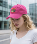 Rose red hat with 'I'm Sexy And I Tow It Vintage Funny Camping RV Camper Truck Hats For Men With Adjustable Straps Outdoor Adventure Baseball Caps For Travel And Weekend Getaways' design worn on city street