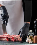 2 Pairs Cut Resistant Arm Sleeves Heavy Slash Proof Arm Guards For Welding Gardening And Mechanic Jobs Built Tough With Breathable PE Mesh So Your Forearms Stay Locked Safe Without The Drama All Day being used while cutting meat.