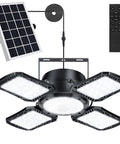 Solar Powered Outdoor Shed Light 128 LED Solar Pendant Lights With Remote, Motion Sensor, shown with solar panel and remote.