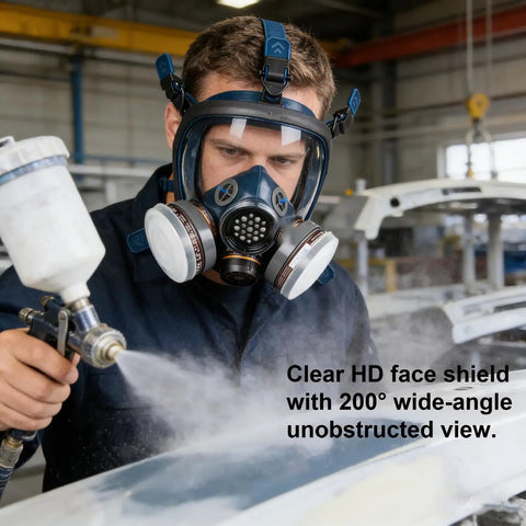 Worker wearing full face gas mask respirator with active carbon filter, using spray gun, industrial environment, safety gear