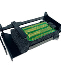 Hands Free Through-Hole Soldering Jig For PCBs And Breadboards CSJ-1 Conforming Fixture holding a green PCB with components