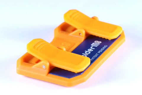 Magnetic Soldering Jig With Nano Suction Base For LED Strip Wiring, orange plastic jig with blue metal base, angled view