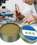 No Clean Solder Flux Paste For Electronics And Plumbing Repairs tin with technician soldering circuit board