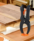 Ratcheting Hand Clamps Set With Quick Release Grip, 6 Inch And 8 Inch Jaw Openings, Heavy Duty Clamps For Woodworking And Carpentry, Pro Grade Build For Studio And Shop Projects, Strong Secure Grip, Easy One Hand Operation, Black And Orange on wood
