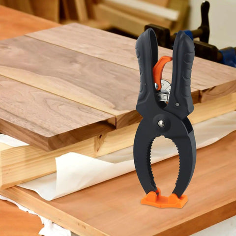 Ratcheting Hand Clamps Set With Quick Release Grip, 6 Inch And 8 Inch Jaw Openings, Heavy Duty Clamps For Woodworking And Carpentry, Pro Grade Build For Studio And Shop Projects, Strong Secure Grip, Easy One Hand Operation, Black And Orange on wood