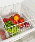 Vibe Shift Your Deep Freeze Setup With Heavy Duty Wire Baskets Acting As Kitchen Storage Organizer Bins For Chest Or Upright Models Refrigerator Dividers With Beefy Handles Four Pack Pearl White containing assorted fruits and vegetables.