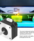 Front view of NEMA 17 stepper motor with silver faceplate, black alloy body, protruding shaft and 4-pin connector.