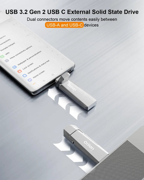 1TB External Portable SSD With Dual Type C And USB A Ports USB 3.2 Gen 2 Up To 1000MB Per Second connected to phone and laptop