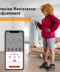 Woman using Portable Cable Strength Trainer With Three Resistance Modes And Fan Cooled Power Pump, showing adjustable resistance on smart LCD.
