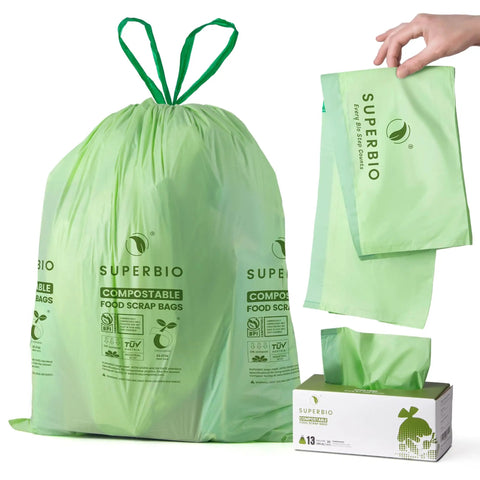 13 Gallon Compostable Drawstring Kitchen Waste Bags Tear Free 49.2 Liter Heavy Duty 1 Mil Food Scrap Bags 30 Count BPI Certified OK Compost Industrial Seedling Safe displayed with packaging and individual bag held by hand.