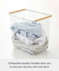 Tosca Style Laundry Basket with Wooden Handles, white steel frame, filled with clothes, collapsible for easy tote, 15 inch large capacity