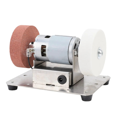 Marhynchus 100W Mini Bench Grinder Electric Multi Purpose Tool With Two Grinding Wheels, showing steel base, motor, and wheels.