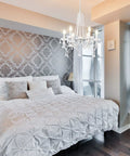 Six Light White Crystal Candle Chandelier For Dining Room And Living Spaces Modern Farmhouse Glam Fixture With Clear Pendant Ornaments Prewired And Easy Install Perfect For Entryway And Foyer hanging in a bedroom.