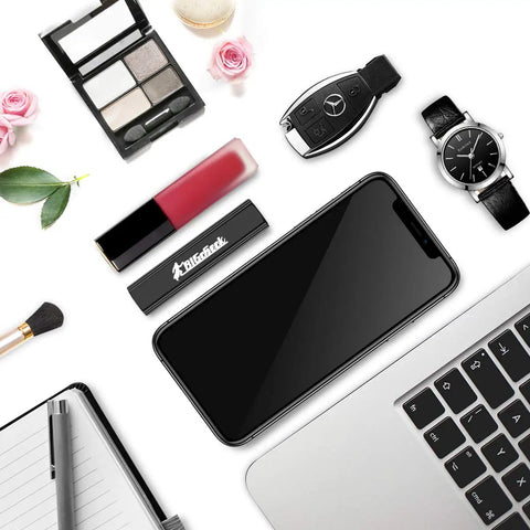 Pocket Size Mini LED Flashlight 3 Pack next to makeup, phone, watch, and laptop, illustrating compact design for everyday carry.