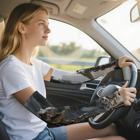 Stay Fly In The Heat Cooling Arm Sleeves For Sun Ray Blocking And Summer Workouts Engineered With Stretchy Ice Silk Material worn by a woman driving.