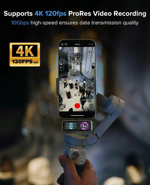 Hands holding iPhone recording in 4K 120fps, using Magnetic Portable SSD 1TB With Built In Fan for pro video work