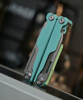 Close-up of folded 20 In 1 EDC Multi Tool Pliers With Spring Loaded Pliers Head Detachable Screwdriver Bits in blue.
