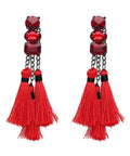 Pair of red tassel earrings with crystal accents and chain links