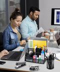 All In One Black Desk Organizer Set For Home Office And School on a desk with people working in the background, office supplies visible