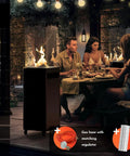 Smokeless 360 Degree Propane Patio Heater, 41,000 BTU, 59 Inch Freestanding Glass Tower On Wheels used in outdoor dining area